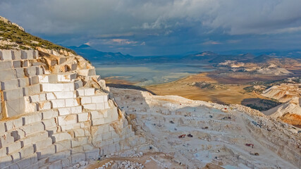 Aerial panorama of marble quarries in Burdur, Turkey. Marble quarry top view. Marble quarry in high altitude mountains.