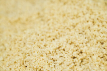 Selective focus on the side dish. Boiled bulungur in close-up. Healthy food with the ability to copy. High quality photo