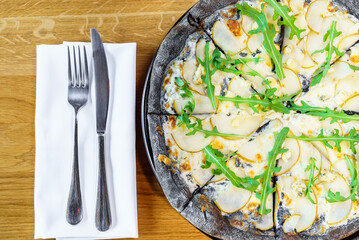 delicious vegetarian pizza with arugula