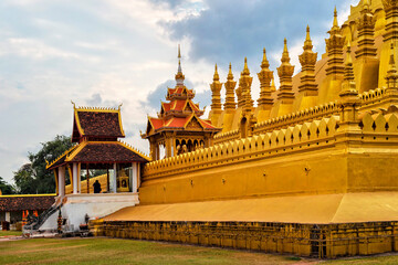 Golden Pagoda in Vientiane, Laos. Pha That Luang Vientiane. Buddhism culture and religion. Sky background beautiful	
