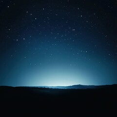 Fototapeta premium Majestic Starry Night Sky Over Dark Silhouetted Rolling Hills Landscape with Atmospheric Glow.