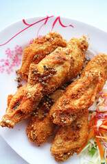 Thai Northern Style Deep Fried Chicken Wings with Spicy Rattan Pepper Called Makwaen
