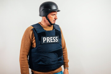 Reporter with bulletproof vest on white background.