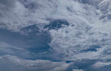 Dark blue stormy cloudy sky background.