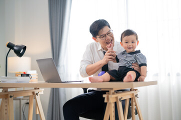Joyful interaction between a grandfather and his grandson during a playful moment at home
