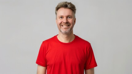 Obraz premium Cheerful Middle-Aged Caucasian Man in Red T-Shirt for Studio Branding and Advertising Campaigns 