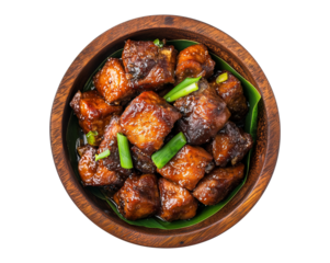 Savory Filipino adobo dish served in wooden bowl, featuring tender marinated meat in rich soy sauce and vinegar glaze, garnished with fresh green onions