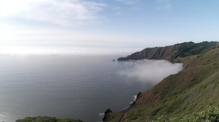 Fototapeta premium Coastal Cliffs and Ocean Mist at Dawn