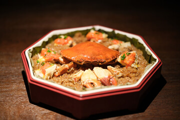 steamed Scylla serrata (mud crab) with rice cake. Chinese seafood cuisine
