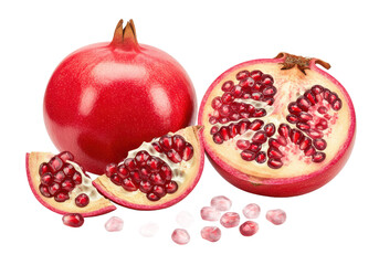 A whole pomegranate with bright red skin, a halved pomegranate showing seeds, and scattered loose seeds, isolated on a white background