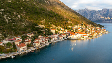 Fototapeta premium Aerial view of Perast, Our Lady of the Rock and St. George Island on shore of Boka Kotor bay, Montenegro.