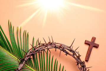crown of thorns, christian cross and palm leaves. Holy Week.