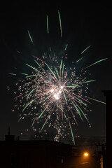 Fireworks behind the building in the background.
