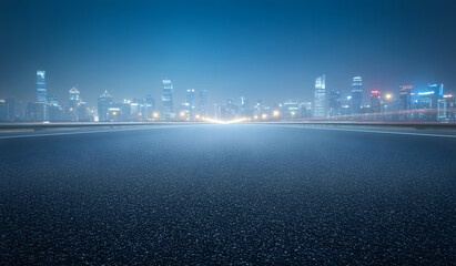 Fototapeta premium night road to the city skyline
