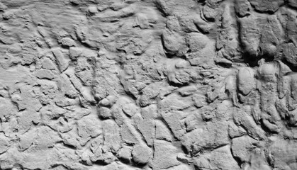 Sliding stone plaster in the image of a lifeless cold desert in the form of abstraction