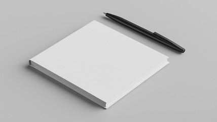 A blank notebook mockup lying flat on a light gray surface, accompanied by a sleek black pen diagonally placed, minimalist and professional