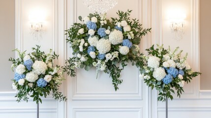 Fototapeta premium A stunning chandelier hangs above a beautiful floral wall adorned with blue and white flowers, perfect for a spring wedding ceremony