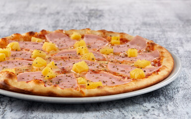 fresh pizza on the white plate