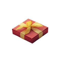 Obraz premium A bright red gift box decorated with a bright yellow ribbon is placed on a clean background, making it perfect for a birthday or holiday celebration. 