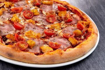 fresh pizza on the white plate