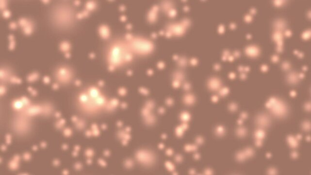 Color of year 2025 mocha mousse abstract motion background. Blurred flying up and down glowing cream peach tan beige particles. Sparkling bubbles bokeh. Shiny festive animation. Holiday decoration