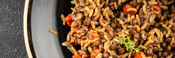 Rice lentil and vegetables snack fresh tasty food dish vegetarian vegan food no meat delicious gourmet food background on the table rustic food top view copy space keto and paleo diet