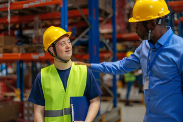 Warehouse manager commending a worker with Down syndrome