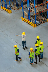 Top view of a foreman firing a warehouse worker