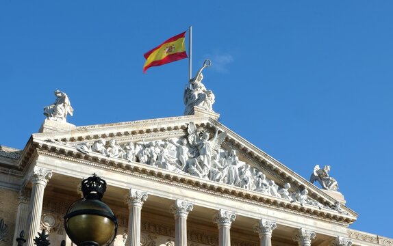 Looking upward on pediment of Spanish National Library in Madrid, Spain. Built in 1896