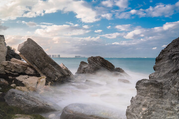 Long Exposure of Water Waves in a Rocky Beach in Cancun, Quintana Roo, Yucatan, Mexico