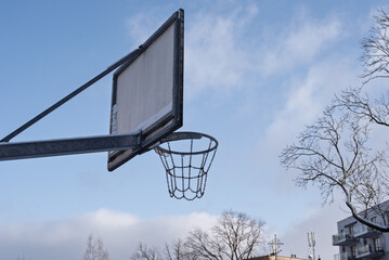 Basketball hoop against the sky