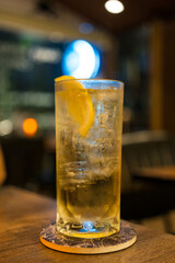 Cocktail, Tom Collins, Front view on table at nigth pub