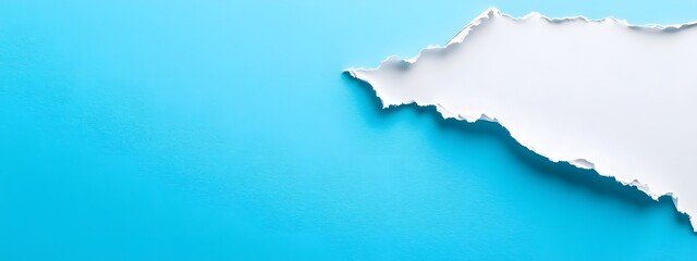 Obraz premium Torn Paper Edge Revealing Soft Blue Minimalist Abstract Composition