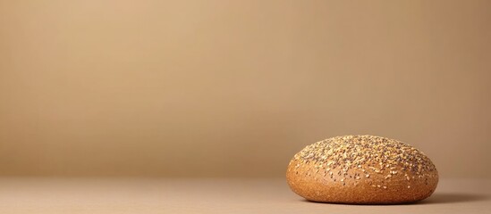 Freshly Baked Round Seeded Rye Bread on Soft Beige Background with Natural Lighting, Displaying Textured Crust and Seeded Topping.
