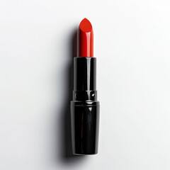 Fototapeta premium A vibrant red lipstick in a sleek black tube, showcasing beauty and cosmetic design. isolated on white background