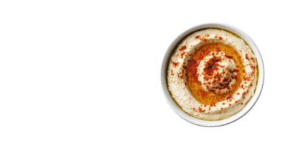 Creamy and Smooth Hummus Topped with Olive Oil and Paprika in a White Bowl, Perfect for Dipping or as a Flavorful Spread on Fresh Bread