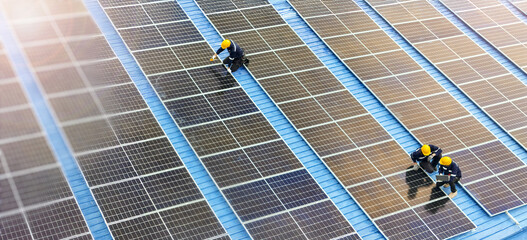 Professional inspecting solar panel installations on a rooftop ensuring renewable energy efficiency and sustainability practices highlighting clean energy technologies and environmental benefits.