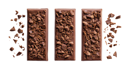 Four sweet bars with nuts and crumbs on a dark background.