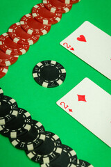 The winning cards with a combination of one pair are neatly laid out on the green table, and the chips. The atmosphere is charged with the excitement of a modest victory in a poker game