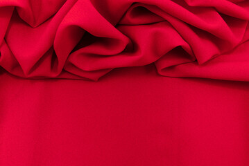 Texture of a smooth luxurious, elegant fabric in pink, purple, red. Purple satin or silk fabric...