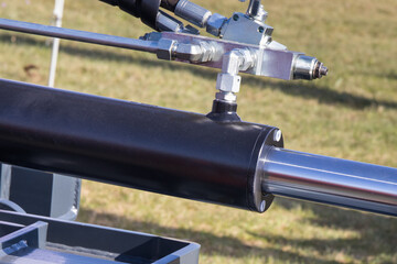 Black pistons or actuators as part of pneumatic or hydraulic machine. Technology