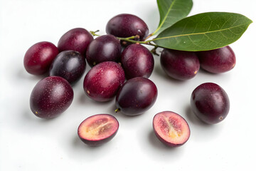Obraz premium Ripe Java Plum (Jamun) with Leaves and Cross-Section on White Background