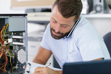 male customer resolving his computer problem