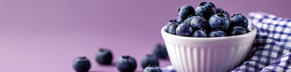 Blueberries in a white cup on a purple background, minimalistic aesthetic. Space for text. Background, wallpaper, banner, poster.