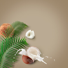 coconuts with milk splash and leaf on a light gbrown background