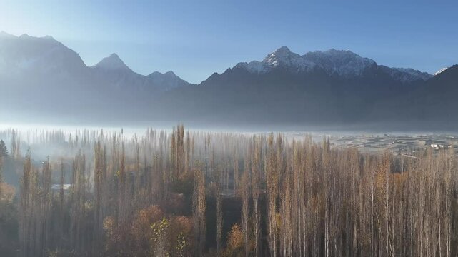 Vibrant aerial view of Hunza Valley, during autumn. Among the rocky mountains. Pakistan