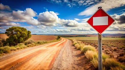 Vibrant Red & White Country Road Sign: Panoramic Dusty Path Landscape Stock Photo