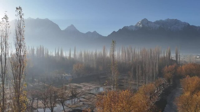 Vibrant aerial view of Hunza Valley, during autumn. Among the rocky mountains. Pakistan
