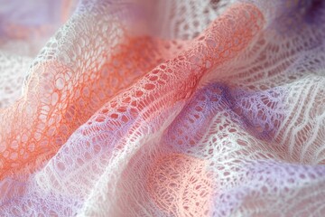 Soft, pastel lace fabric drapes gently.