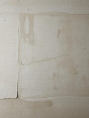 Rough, textured concrete wall with distressed, aged surface, abstract, backdrop